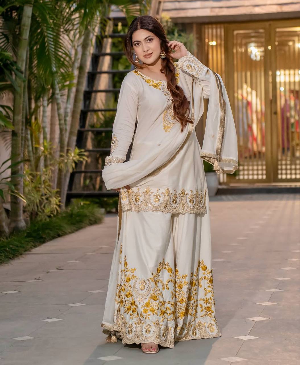 Pure Heavy Natural Crep Silk With Heavy Embroidery Work With Fancy Borders Less Work Sleeve With Fancy Latkan Dori.